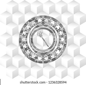 magic stick icon inside grey badge with geometric cube white background