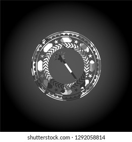 magic stick icon inside grey camouflaged emblem