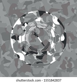 magic stick icon inside grey camo emblem