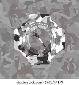 magic stick icon inside grey camouflage texture. 
