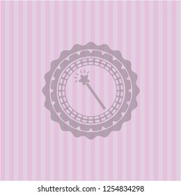 magic stick icon inside pink emblem