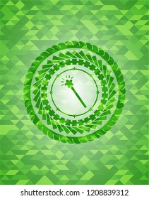 magic stick icon inside realistic green mosaic emblem