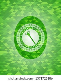 magic stick icon inside realistic green mosaic emblem