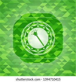 magic stick icon inside realistic green emblem. Mosaic background