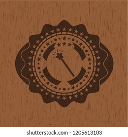 magic stick icon inside retro wooden emblem