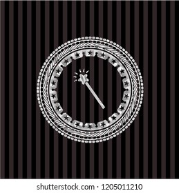 magic stick icon inside silvery emblem or badge