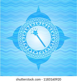 magic stick icon inside sky blue water emblem background.