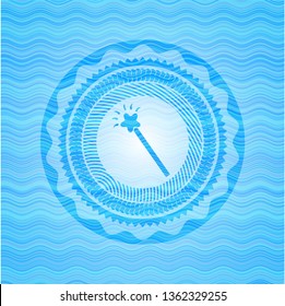 magic stick icon inside sky blue water wave style emblem.
