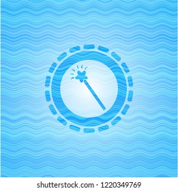 magic stick icon inside water wave style badge.