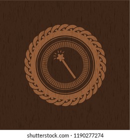 magic stick icon inside wooden emblem. Vintage.