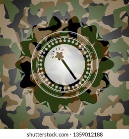 magic stick icon on camo pattern