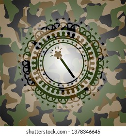 magic stick icon on camo pattern