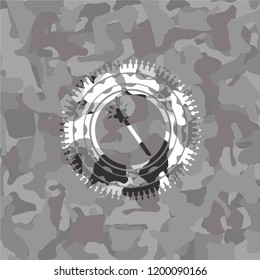 magic stick icon on grey camo pattern