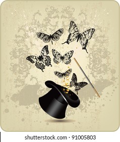 Magic wand and hat with butterflies on a vintage background