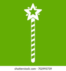 Magic wand icon white isolated on green background. Vector illustration
