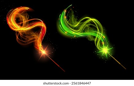 Magic wands set isolated on black background. Vector realistic illustration of neon orange, green light trails, sparkling fairytale swirls with glowing glitter particles, fantasy spell energy vortex