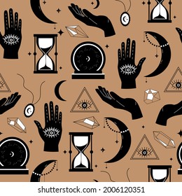 Magical items for fortune telling and astrology seamless pattern in a modern style. Vector illustration