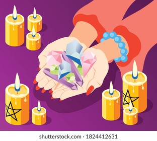 Magical services isometric composition with hands of fortune teller holding bunch of stones with burning candles vector illustration
