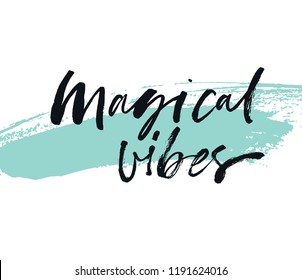 Magical vibes phrase with hand drawn brushstrokes. Inspirational quote. Brush painted letters, vector illustration. Modern calligraphy.