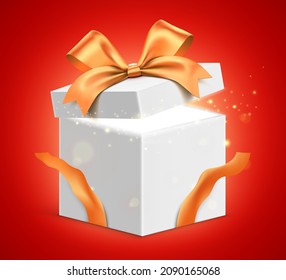 Magical white gift box with a golden ribbon and magical glitter light shining from inside. Shiny vector present box standing on red gradient background.