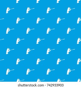 Magician hand with a magic wand pattern repeat seamless in blue color for any design. Vector geometric illustration