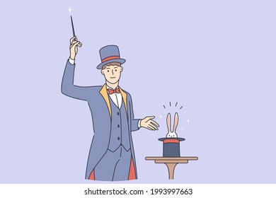 Magician making trick during work concept. Young smiling man magician wearing traditional costume standing with stick making magic trick with rabbit in hat vector illustration