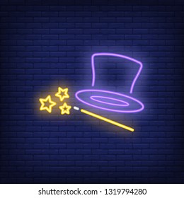 Magician topper hat and wand neon sign. Magic design. Night bright neon sign, colorful billboard, light banner. Vector illustration in neon style.