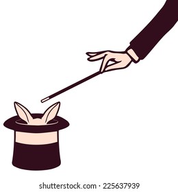 Magician's hand performing a magic trick on white rabbit in cylinder