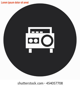 Magnetic cassette player web icon. Gray circle button with white illustration.