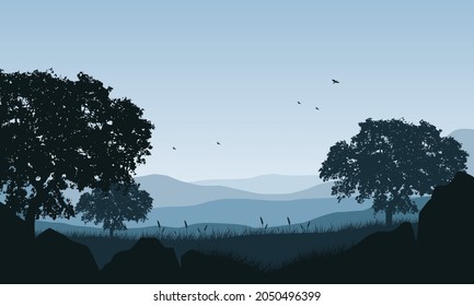 Magnificent panorama of the mountains in the morning from the countryside with the silhouettes of large trees around it. Vector illustration of a city