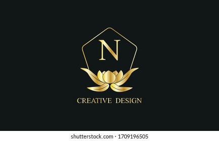 Magnificent royal vector monogram with letter N on black background. Stylish golden floral logo for business, restaurant, boutique, cafe, hotel and more.