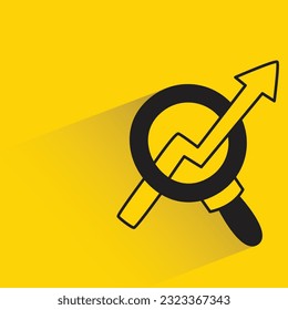 vidrio magnificador y gráfico con sombra sobre fondo amarillo