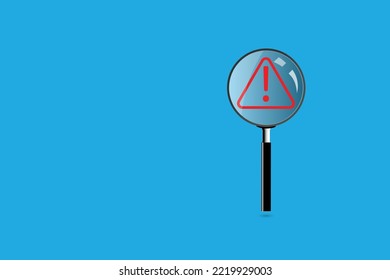 Magnifier glass with red triangle caution warning sign for notification error.