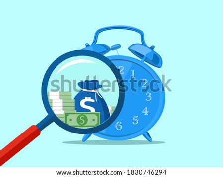 Magnifying glass and clock. The concept of time is the most valuable asset