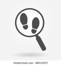 Magnifying glass with footsteps icon