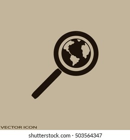 Magnifying glass with a globe