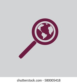 Magnifying glass with a globe