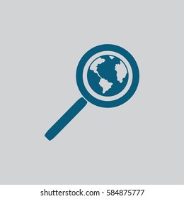 Magnifying glass with a globe