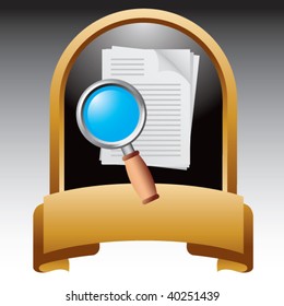 magnifying glass in gold document