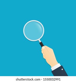 Magnifying glass in hand. Search loupe. Vector illustration in flat style