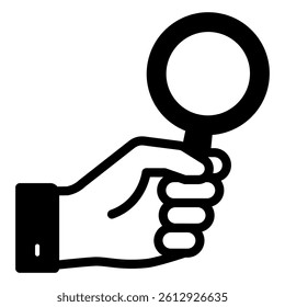 Magnifying glass in hand solid icon, optical tool concept. Vector graphics. Magnifier in human hand sign on white background, style mobile or design