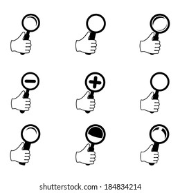 Magnifying glass in hands