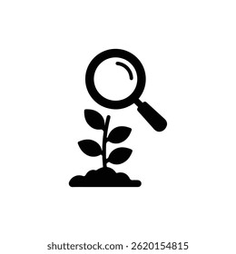 Magnifying Glass Hovering Over Plant Representing Focus on Personal Growth
