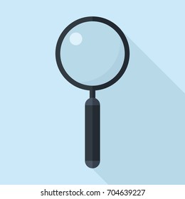 Magnifying glass icon in flat design