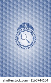 magnifying glass icon inside blue hexagon emblem.