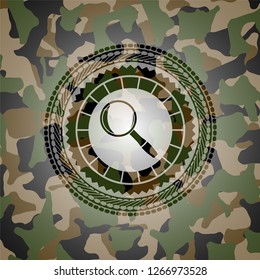 magnifying glass icon inside camouflage texture