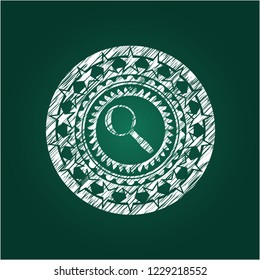 magnifying glass icon inside chalk emblem