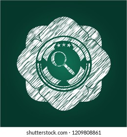 magnifying glass icon inside chalkboard emblem