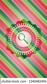magnifying glass icon inside christmas emblem background.