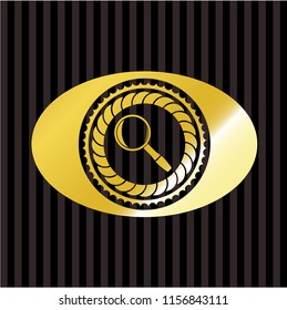 magnifying glass icon inside gold shiny badge
